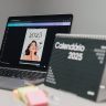 Organized office desk with 2025 calendar and laptop for modern productivity.